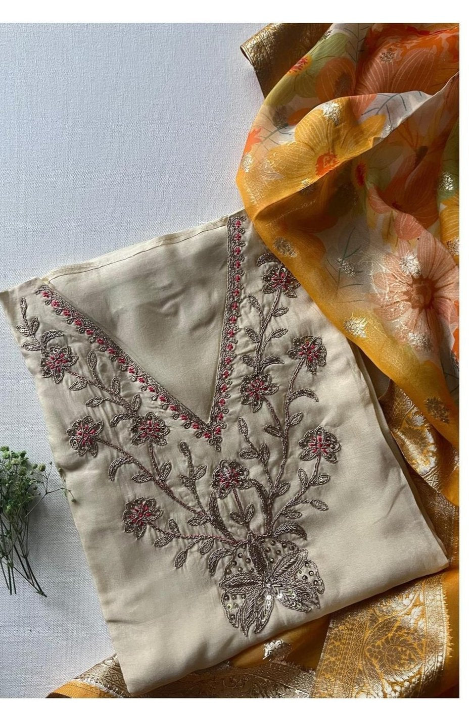 Muslin top with detailed embroidered neckline